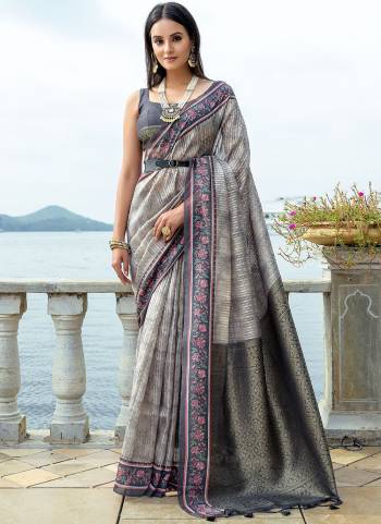 Garb These Festive Wear Saree in Fine Colored.These Saree And Blouse is Fabricated On Soft Silk.Its Beautified With Wevon Rich Pallu Jari Designer With Printed.