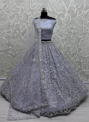 For A Fancy Designer Look,Grab These Lehenga Choli With Dupatta in Fine Colored.These Lehenga Are Net Crafted And Choli Are Net And Dupatta Are Fabricated On Soft Net Pair.Its Beautified With Heavy Designer Sequance,Thread Embroidery Work.
