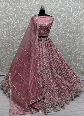 For A Fancy Designer Look,Grab These Lehenga Choli With Dupatta in Fine Colored.These Lehenga Are Net Crafted And Choli Are Net And Dupatta Are Fabricated On Soft Net Pair.Its Beautified With Heavy Designer Sequance,Thread Embroidery Work.