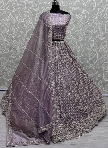 For A Fancy Designer Look,Grab These Lehenga Choli With Dupatta in Fine Colored.These Lehenga Are Net Crafted And Choli Are Net And Dupatta Are Fabricated On Soft Net Pair.Its Beautified With Heavy Designer Sequance,Thread Embroidery Work.