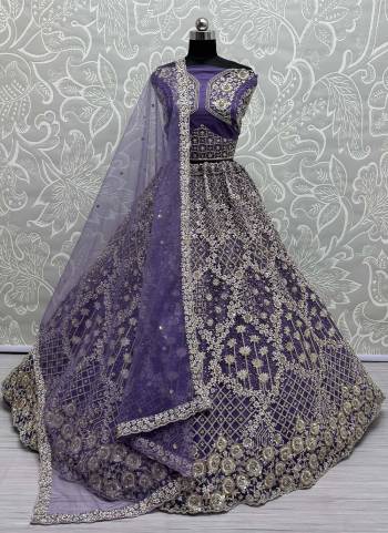 For A Fancy Designer Look,Grab These Lehenga Choli With Dupatta in Fine Colored.These Lehenga Are Double Net Crafted And Choli Are Net And Dupatta Are Fabricated On Soft Net Pair.Its Beautified With Designer Sequance,Multy Thread,Dori Embroidery Work.