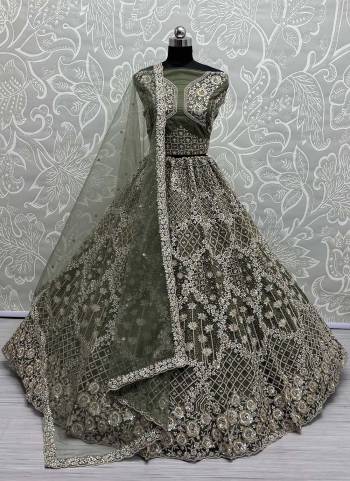For A Fancy Designer Look,Grab These Lehenga Choli With Dupatta in Fine Colored.These Lehenga Are Double Net Crafted And Choli Are Net And Dupatta Are Fabricated On Soft Net Pair.Its Beautified With Designer Sequance,Multy Thread,Dori Embroidery Work.