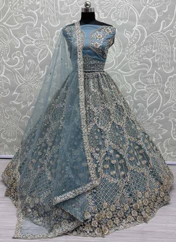 For A Fancy Designer Look,Grab These Lehenga Choli With Dupatta in Fine Colored.These Lehenga Are Double Net Crafted And Choli Are Net And Dupatta Are Fabricated On Soft Net Pair.Its Beautified With Designer Sequance,Multy Thread,Dori Embroidery Work.