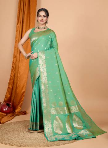 Garb This Party Wear Saree Paired With Blouse.This Saree And Blouse Are Soft Banarasi Silk Based Fabric With Wevon Jari Designer. Buy This Pretty Saree Now.