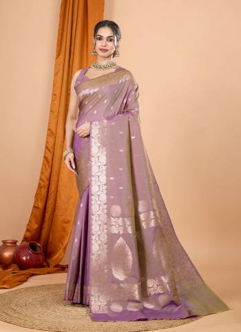 Garb This Party Wear Saree Paired With Blouse.This Saree And Blouse Are Soft Banarasi Silk Based Fabric With Wevon Jari Designer. Buy This Pretty Saree Now.