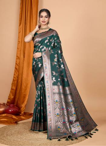 Attrective This Party Wear Saree Paired With Blouse.This Saree And Blouse Are Soft Banarasi Silk Based Fabric With Wevon Jari Designer. Buy This Pretty Saree Now.