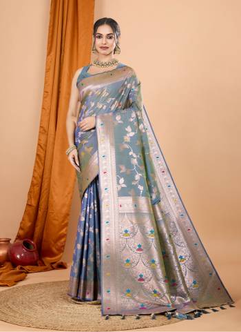 Attrective This Party Wear Saree Paired With Blouse.This Saree And Blouse Are Soft Banarasi Silk Based Fabric With Wevon Jari Designer. Buy This Pretty Saree Now.