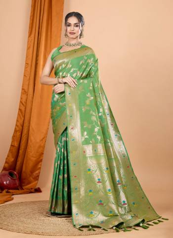 Attrective This Party Wear Saree Paired With Blouse.This Saree And Blouse Are Soft Banarasi Silk Based Fabric With Wevon Jari Designer. Buy This Pretty Saree Now.