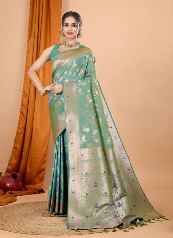 Attrective This Party Wear Saree Paired With Blouse.This Saree And Blouse Are Soft Banarasi Silk Based Fabric With Wevon Jari Designer. Buy This Pretty Saree Now.