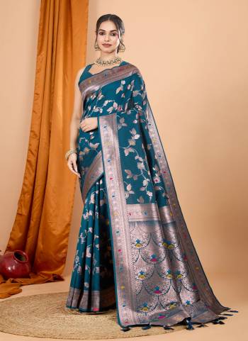 Attrective This Party Wear Saree Paired With Blouse.This Saree And Blouse Are Soft Banarasi Silk Based Fabric With Wevon Jari Designer. Buy This Pretty Saree Now.