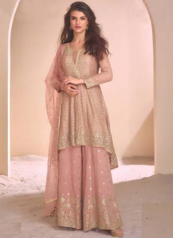 Garb These Party Wear Designer Plazzo Suits in Fine Colored Pair With Dupatta.These Top And Dupatta Are Fabricated On Georgette Pair With Georgette Bottom.Its Beautified With Designer Heavy Embroidery Work.