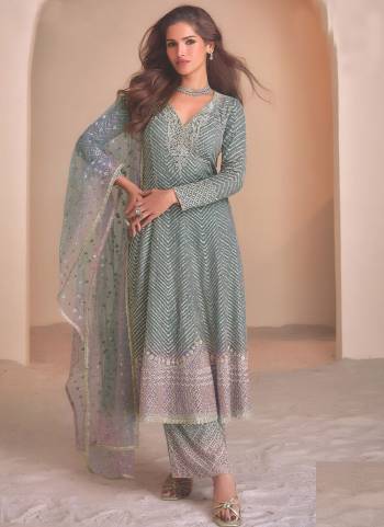 Garb These Party Wear Designer Plazzo Suits in Fine Colored Pair With Dupatta.These Top And Dupatta Are Fabricated On Georgette Pair With Georgette Bottom.Its Beautified With Designer Heavy Embroidery Work.