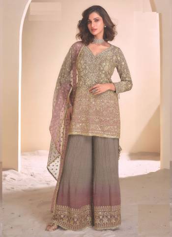 Garb These Party Wear Designer Plazzo Suits in Fine Colored Pair With Dupatta.These Top And Dupatta Are Fabricated On Georgette Pair With Georgette Bottom.Its Beautified With Designer Heavy Embroidery Work.