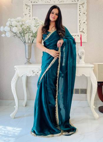Attrective These Party Wear Ready To Wear Saree in Fine Colored.These Saree Are Fendy Satin And Blouse is Fendy Satin Fabricated.Its Beautified With Two Tone Solid With Designer Sequance Embroidery Work Lace Border.