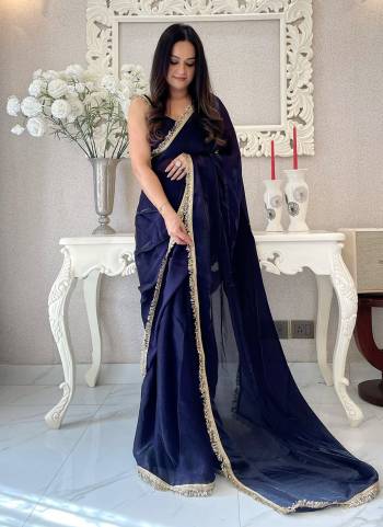 Attrective These Party Wear Ready To Wear Saree in Fine Colored.These Saree Are Fendy Satin And Blouse is Fendy Satin Fabricated.Its Beautified With Two Tone Solid With Designer Sequance Embroidery Work Lace Border.