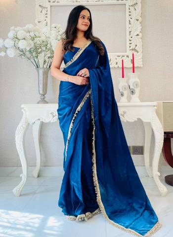 Attrective These Party Wear Ready To Wear Saree in Fine Colored.These Saree Are Fendy Satin And Blouse is Fendy Satin Fabricated.Its Beautified With Two Tone Solid With Designer Sequance Embroidery Work Lace Border.