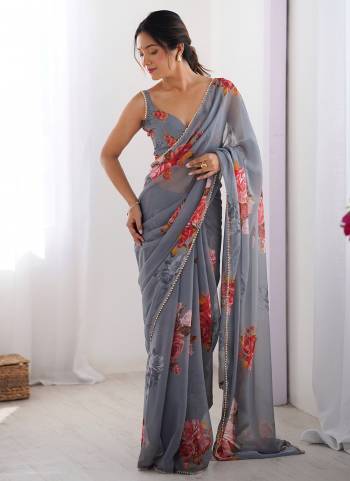 Garb These Party Wear Saree in Fine Colored.These Saree Are Georgette And Blouse is Georgette Fabricated.Its Beautified With Designer Floral Hand Printed With Moti Lace Work.
