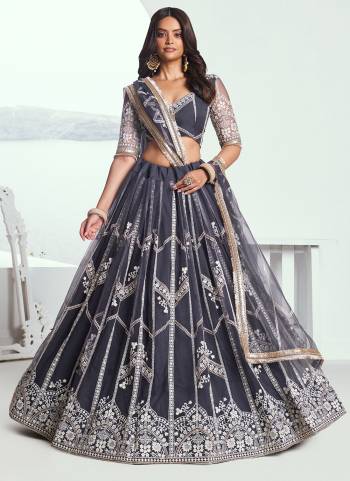 For A Different Look,Grab These Party Wear Designer Lehenga in All Over Pretty Colored Pair With Blouse And Dupatta.These Lehenga Choli And Dupatta is All Over Butterfly Net Base Fabric With Designer Thread Embroidery Work.