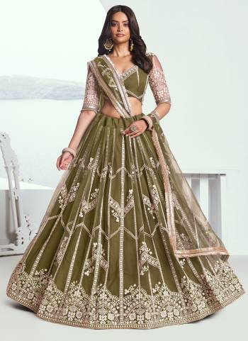 For A Different Look,Grab These Party Wear Designer Lehenga in All Over Pretty Colored Pair With Blouse And Dupatta.These Lehenga Choli And Dupatta is All Over Butterfly Net Base Fabric With Designer Thread Embroidery Work.