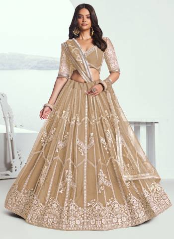 For A Different Look,Grab These Party Wear Designer Lehenga in All Over Pretty Colored Pair With Blouse And Dupatta.These Lehenga Choli And Dupatta is All Over Butterfly Net Base Fabric With Designer Thread Embroidery Work.