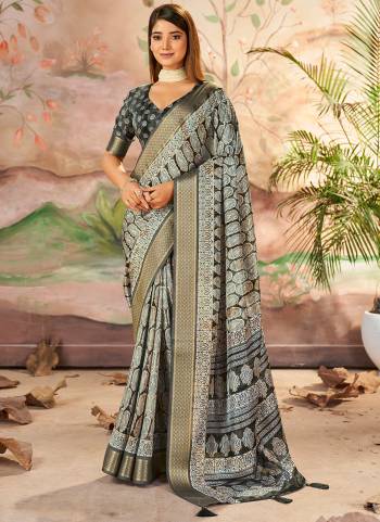  Looking These Party Wear Saree in Fine Colored.These Saree And Blouse is Fabricated On Dolla Silk Pair.Its Beautified With Wevon Jari Border Designer With Printed.
