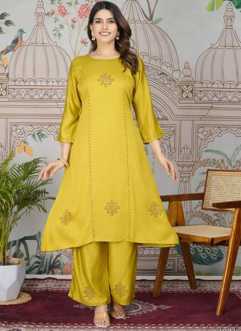 Attrective These Designer Top With Bottom In Fine Colored Pair.These Top And Bottom Are Fabricated On Gajji Silk Pair.Its Beautified With Designer Embroidery Work.