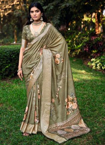 Attractive These Party Wear Saree in Fine Colored.These Saree And Blouse is Fabricated On Cotton Silk Pair.Its Beautified With Wevon Jari Border Designer With Digital Floral Printed.
