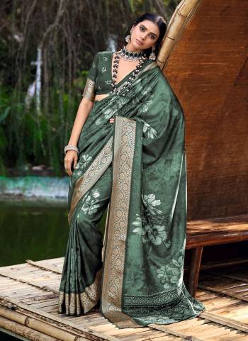 Attractive These Party Wear Saree in Fine Colored.These Saree And Blouse is Fabricated On Cotton Silk Pair.Its Beautified With Wevon Jari Border Designer With Digital Floral Printed.
