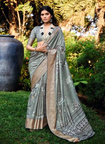 Attractive These Party Wear Saree in Fine Colored.These Saree And Blouse is Fabricated On Cotton Silk Pair.Its Beautified With Wevon Jari Border Designer With Digital Floral Printed.