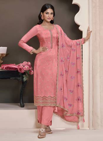 Pink colored Salwar Suit is prettified with Embroidery work And Sequence Work as shown which makes it appear classy. This top is made of Silk fabric which is accompanied with Santoon Bottom,Santoon Inner and Georgette dupatta. Women can buy this suit to wear for their parties and functions.
