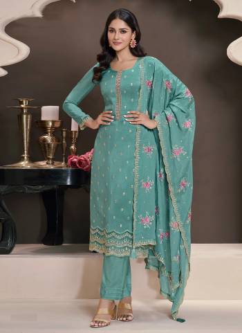 Sky colored Salwar Suit is prettified with Embroidery work And Sequence Work as shown which makes it appear classy. This top is made of Silk fabric which is accompanied with Santoon Bottom,Santoon Inner and Georgette dupatta. Women can buy this suit to wear for their parties and functions.