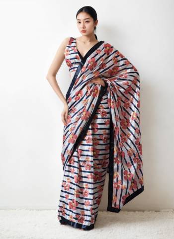 Looking These Fastive Wear Saree in Fine Colored.