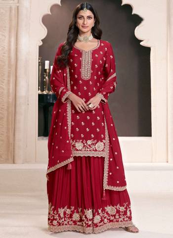 Garb These Designer Plazzo Suits in Fine Colored Pair With Dupatta.These Top Are Chinon And Dupatta Are Fabricated On Chinon Pair With Chinon Bottom.Its Beautified With Heavy Designer Embroidery Work
