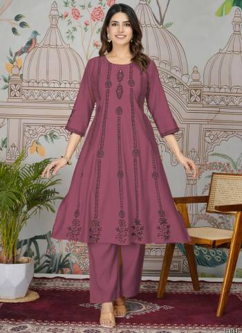 Attrective These Designer Top With Bottom in Fine Colored.These Top And Bottom Are Fabricated On Viscose Roman Silk Pair.Its Beautified With Designer Embroidery Work.