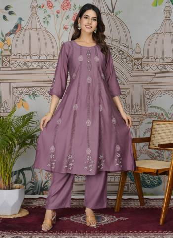 Attrective These Designer Top With Bottom in Fine Colored.These Top And Bottom Are Fabricated On Viscose Roman Silk Pair.Its Beautified With Designer Embroidery Work.