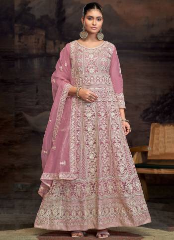 Garb These Designer Anarkali Suit in Fine Colored Pair With Bottom And Dupatta.These Top Are Net And Dupatta Are Fabricated On Net Pair With Santoon Bottom.Its Beautified With Santoon Inner.Its Beautified With Heavy Designer Embroidery Work.