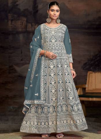 Garb These Designer Anarkali Suit in Fine Colored Pair With Bottom And Dupatta.These Top Are Net And Dupatta Are Fabricated On Net Pair With Santoon Bottom.Its Beautified With Santoon Inner.Its Beautified With Heavy Designer Embroidery Work.