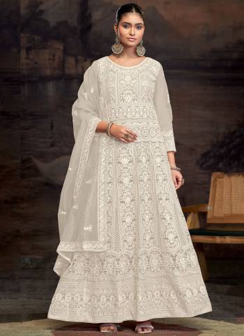 Garb These Designer Anarkali Suit in Fine Colored Pair With Bottom And Dupatta.These Top Are Net And Dupatta Are Fabricated On Net Pair With Santoon Bottom.Its Beautified With Santoon Inner.Its Beautified With Heavy Designer Embroidery Work.
