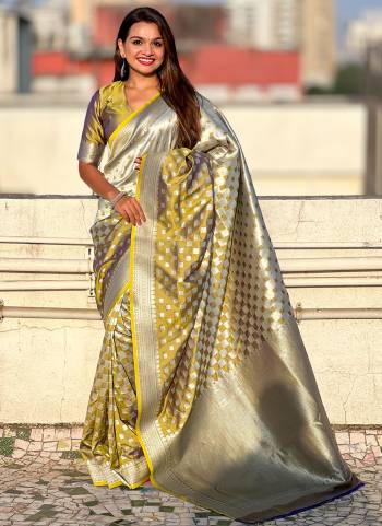 Attractive These Party Wear Saree in Fine Colored.These Saree And Blouse is Fabricated On Banarasi Silk.Its Beautified With Weaving Silver Jari Checks Designer.