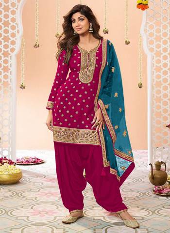 Garb These Designer Patiyala Suit in Fine Colored Pair With Bottom And Dupatta.These Top Are Jacquard Silk And Dupatta Are Fabricated On Net Pair With Santoon Bottom.Its Beautified With Santoon Inner.Its Beautified With Wevon Designer, Embroidery Work.