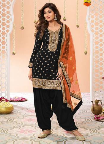 Garb These Designer Patiyala Suit in Fine Colored Pair With Bottom And Dupatta.These Top Are Jacquard Silk And Dupatta Are Fabricated On Net Pair With Santoon Bottom.Its Beautified With Santoon Inner.Its Beautified With Wevon Designer, Embroidery Work.