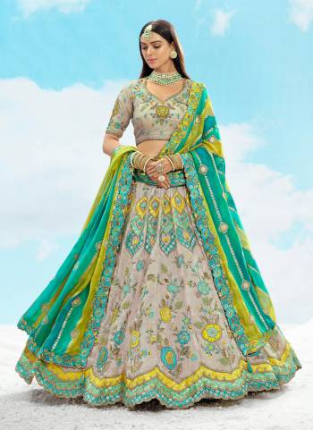 For A Designer Look,Grab These Lehenga Choli in Fine Colored.These Lehenga And Blouse Are Fabricated On Silk Pair With Georgette Dupatta.Its Beautified With Wevon Butty Designer With Sequance Embroidery,Stone, Cut Work.