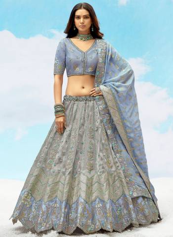 For A Designer Look,Grab These Lehenga Choli in Fine Colored.These Lehenga And Blouse Are Fabricated On Silk Pair With Georgette Dupatta.Its Beautified With Wevon Butty Designer With Sequance Embroidery,Stone, Cut Work.