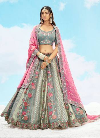 For A Designer Look,Grab These Lehenga Choli in Fine Colored.These Lehenga And Blouse Are Fabricated On Silk Pair With Georgette Dupatta.Its Beautified With Wevon Butty Designer With Sequance Embroidery,Stone, Cut Work.