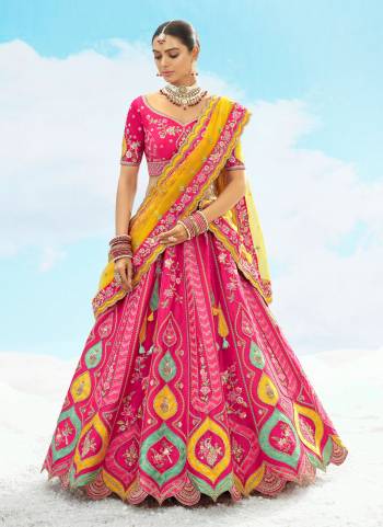 For A Designer Look,Grab These Lehenga Choli in Fine Colored.These Lehenga And Blouse Are Fabricated On Silk Pair With Net Dupatta.Its Beautified With Wevon Butty Designer With Sequance Embroidery,Stone, Cut Work.