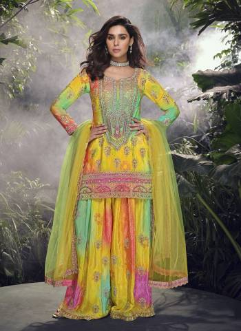 Garb These Party Wear Designer Plazzo Suits in Fine Colored Pair With Dupatta.These Top Are Chinon And Dupatta Are Fabricated On Net Pair With Chinon Bottom.Its Beautified With Printed,Designer Embroidery Work