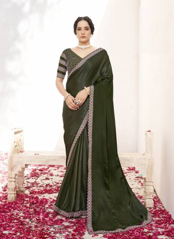 Look Attractive These Designer Party Wear Saree in Fine Colored.These Saree Are Crepe Satin Silk And Blouse Satin Silk is Fabricated.Its Beautified Fancy Desiger Work.