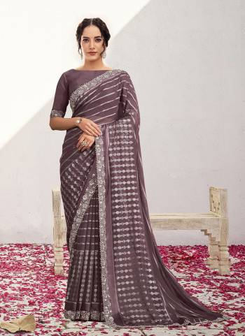 Look Attractive These Designer Party Wear Saree in Fine Colored.These Saree Are Georgette Kasab And Blouse Malai Satin is Fabricated.Its Beautified Fancy Desiger Work.