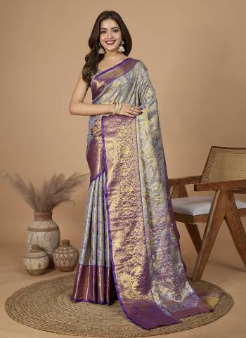 Garb This Partywear Saree Paired With Blouse.This Saree And Blouse Are Soft Silk Based Fabric With Heavy Wevon Jari Rich Pallu Designer. Buy This Pretty Saree Now.