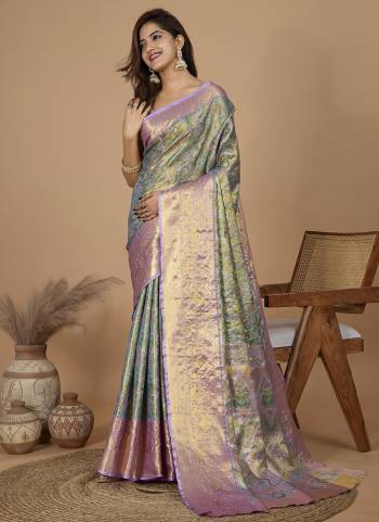 Garb This Partywear Saree Paired With Blouse.This Saree And Blouse Are Soft Silk Based Fabric With Heavy Wevon Jari Rich Pallu Designer. Buy This Pretty Saree Now.